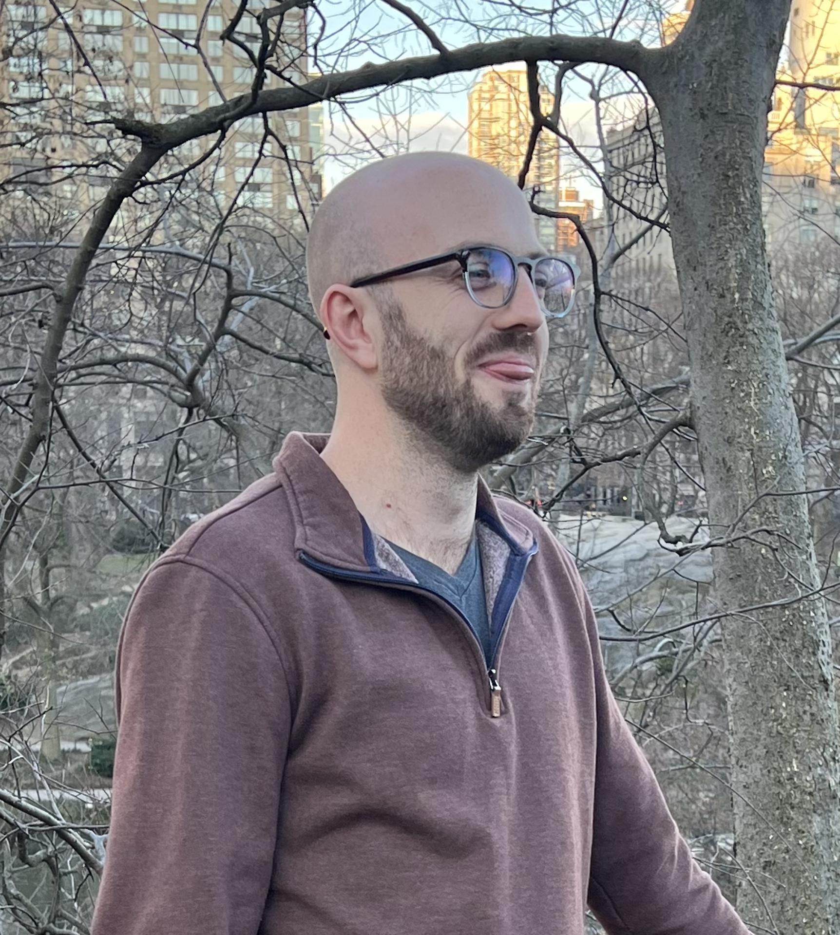 Mitchell White at Central Park, staring off into the distance