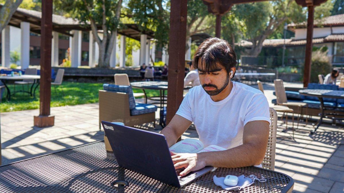 Saint Mary's Student Studying Outdoors on Campus